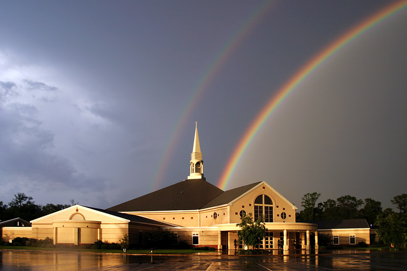 Rainbow over church